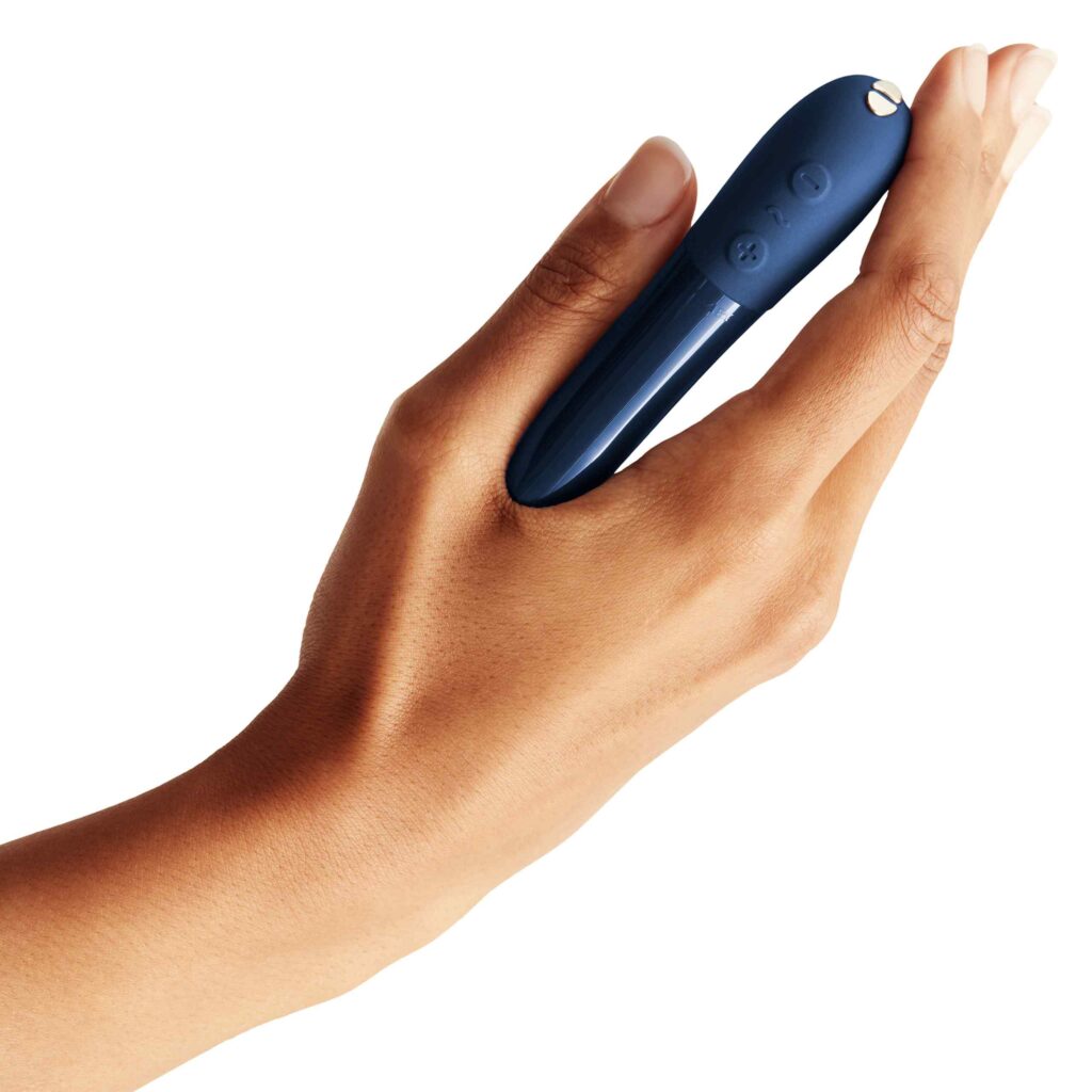 We-Vibe Tango X Bullet Vibrator - Clitor Mini Vibrator - Midnight Blue - in hand - product photo on white